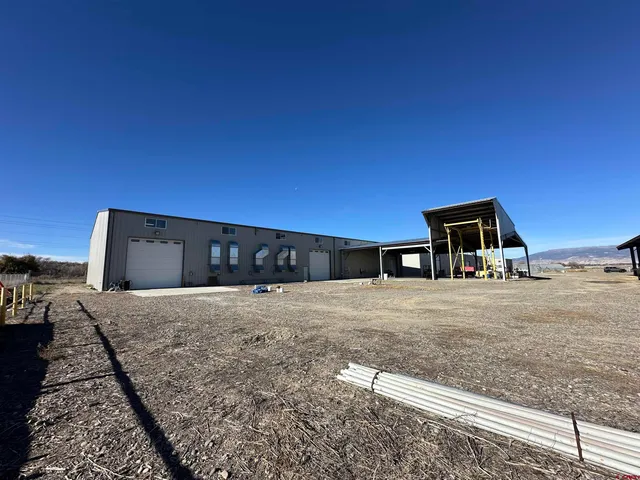 a house view with a backyard space
