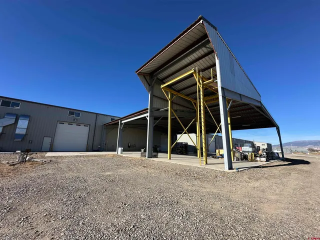 a view of a back yard of the house