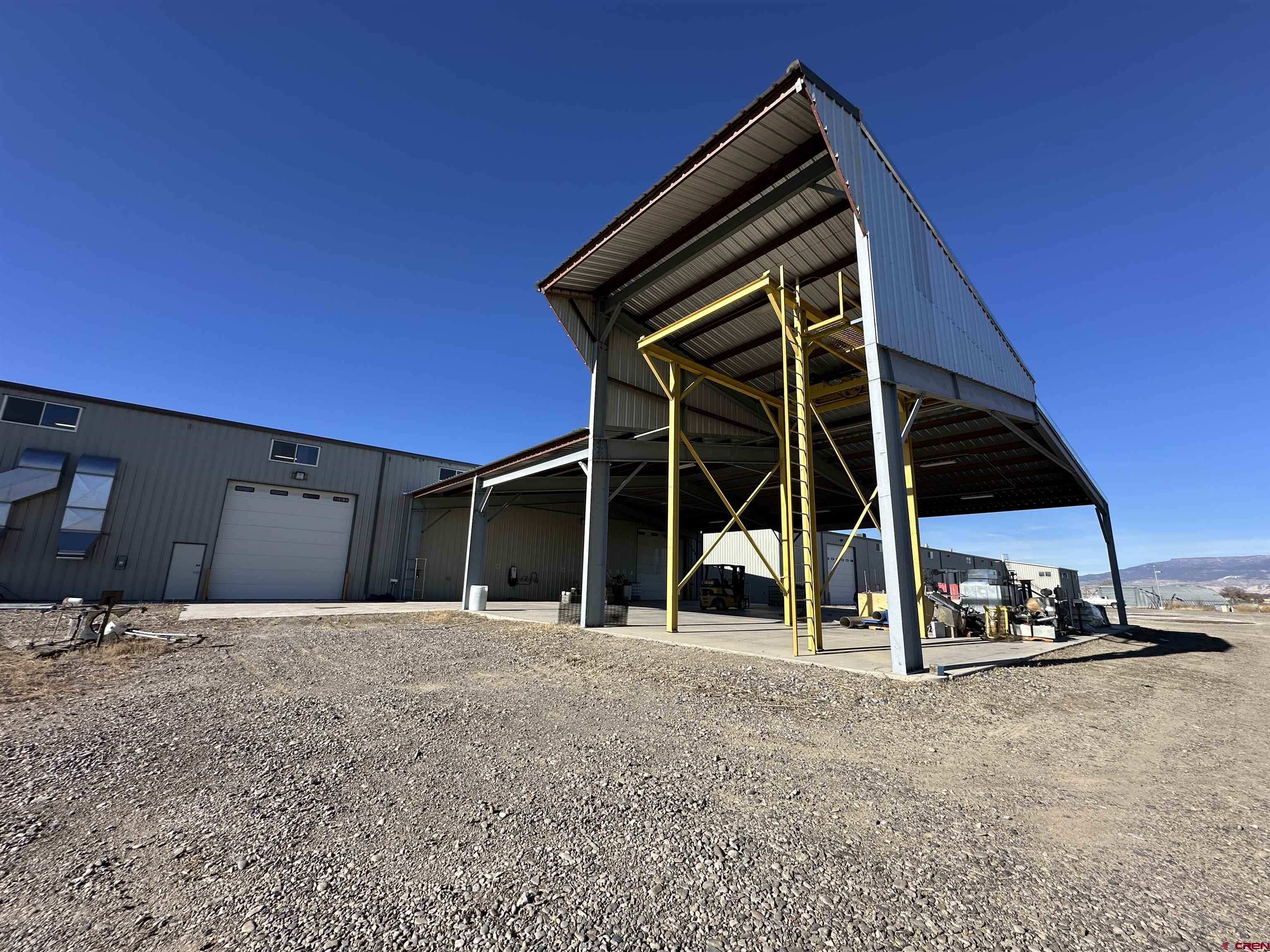 18668 B50 Road, Unit BUILDING B & C Delta, CO 81416 - Photo 11 of 17 a view of a house with entertaining space