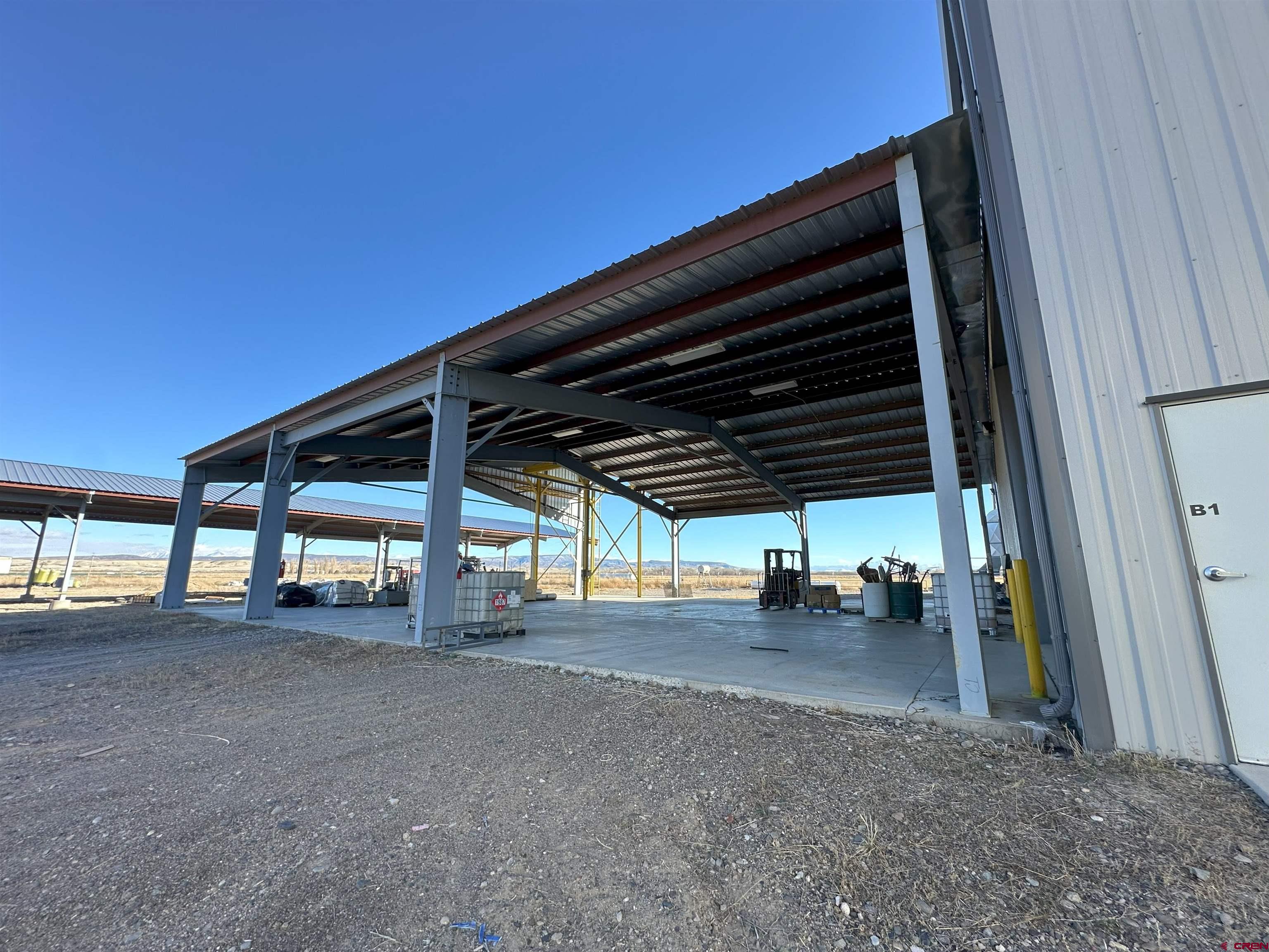 18668 B50 Road, Unit BUILDING B & C Delta, CO 81416 - Photo 15 of 17 a view of under construction area and car parked