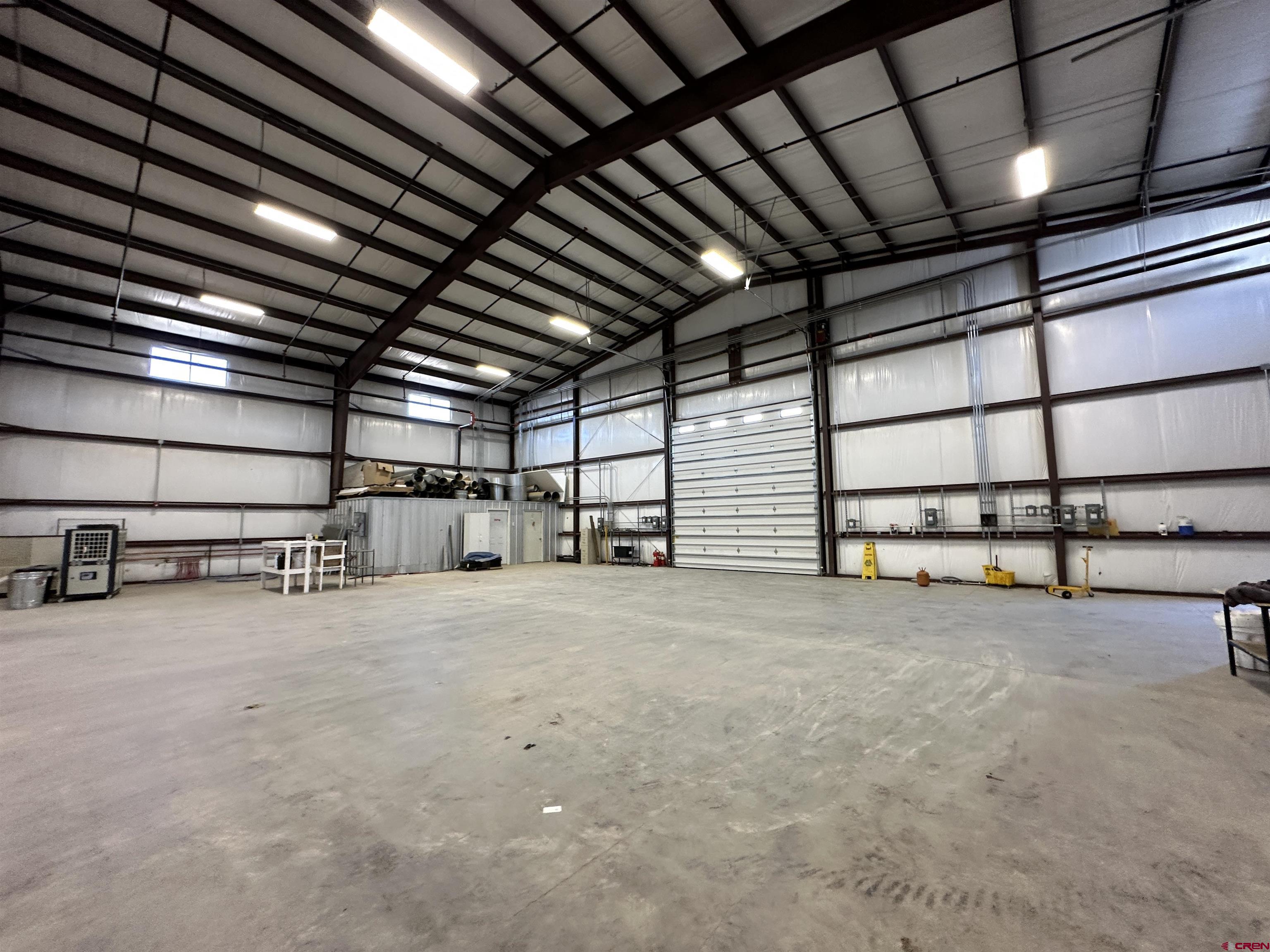 18668 B50 Road, Unit BUILDING B & C Delta, CO 81416 - Photo 6 of 17 a view of an empty room with garage