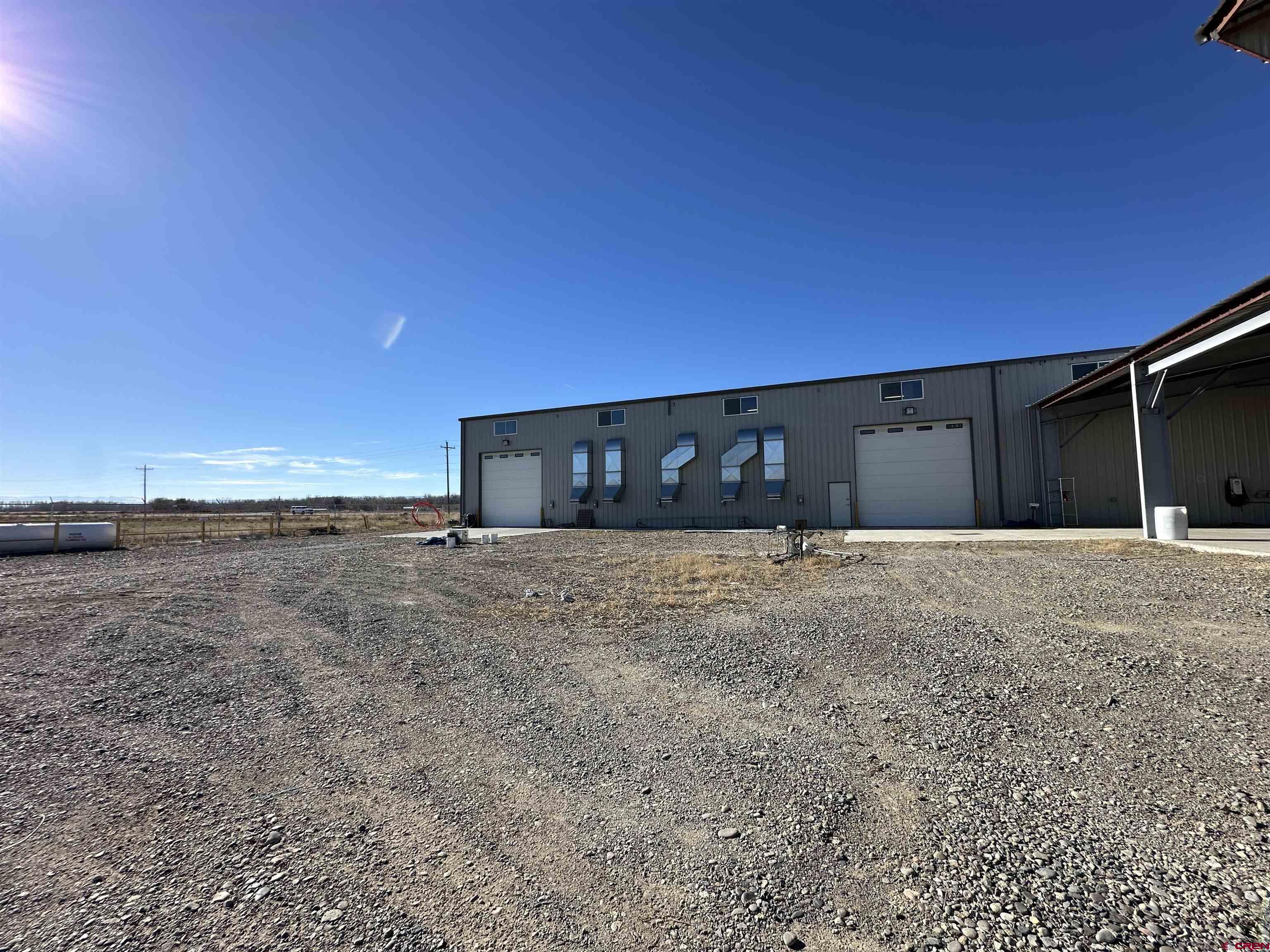 18668 B50 Road, Unit BUILDING B & C Delta, CO 81416 - Photo 7 of 17 a view of a backyard