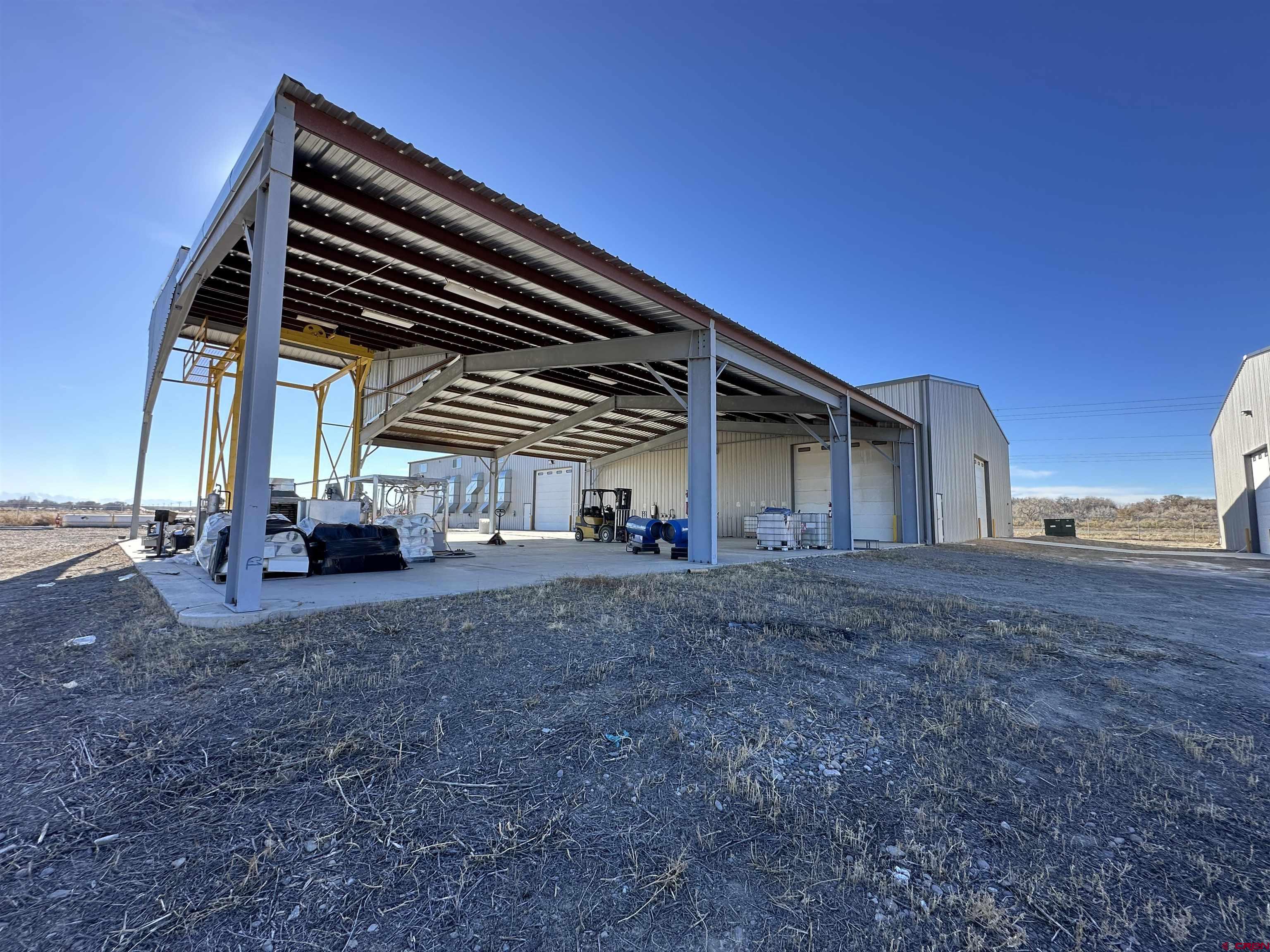 18668 B50 Road, Unit BUILDING B & C Delta, CO 81416 - Photo 10 of 17 a house view with a backyard space