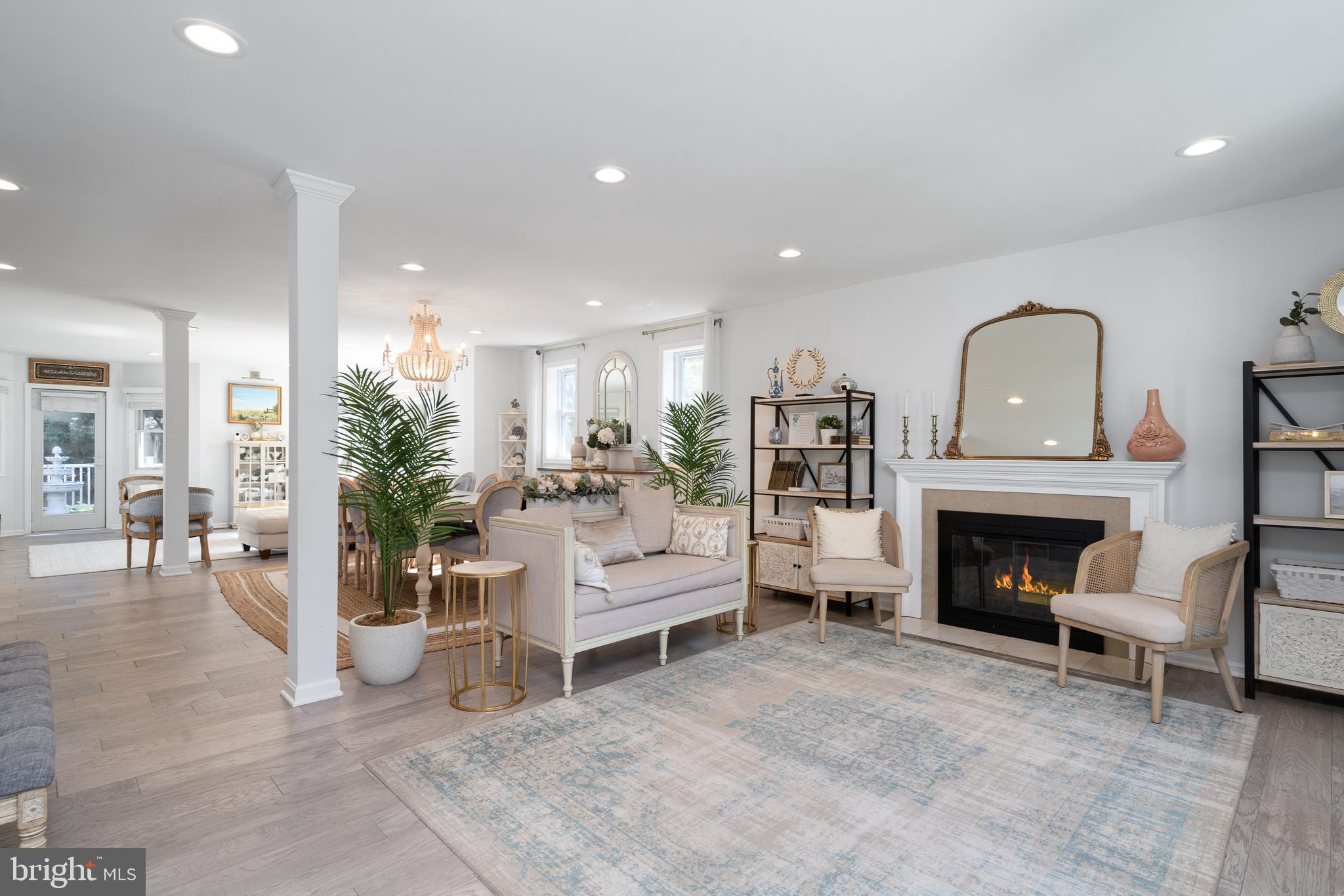 6401 Winnepeg Road Bethesda, MD 20817 - Photo 3 of 41 a view of a livingroom with furniture and a fireplace