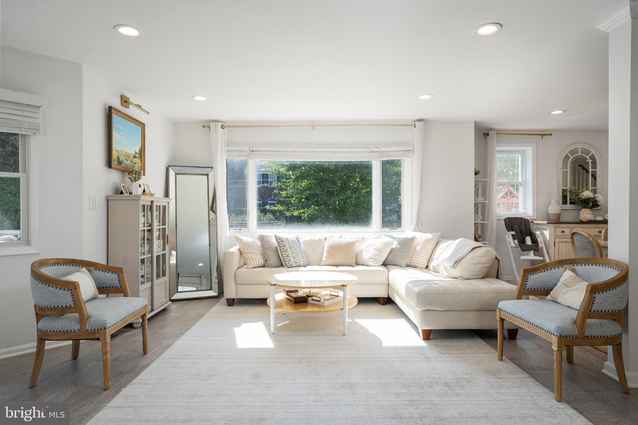 6401 Winnepeg Road Bethesda, MD 20817 - Photo 9 of 41 a living room with furniture and a large window