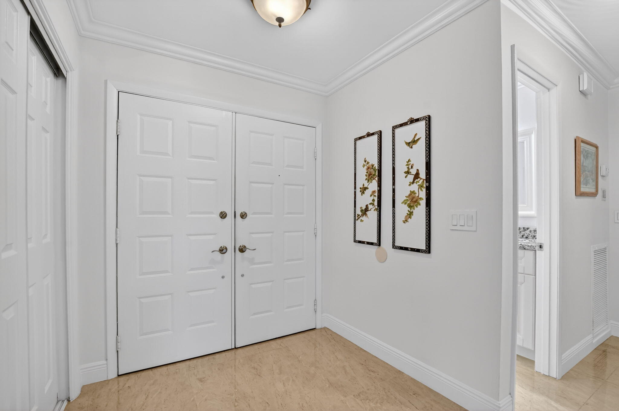 4205 Birchwood Drive Boca Raton, FL 33487 - Photo 14 of 75 an empty room with windows and cabinet