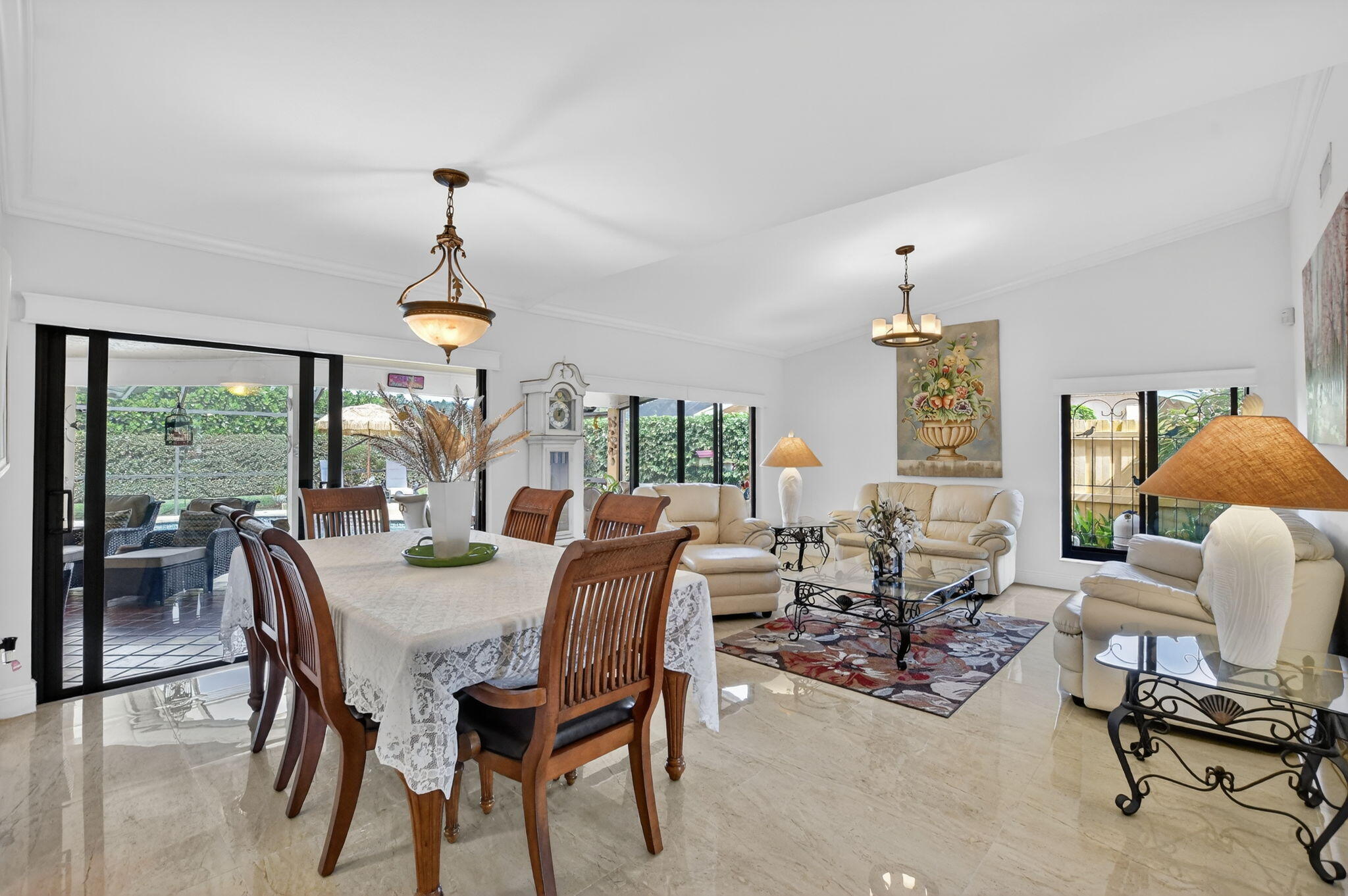 4205 Birchwood Drive Boca Raton, FL 33487 - Photo 15 of 75 a view of a dining room with furniture window and outside view