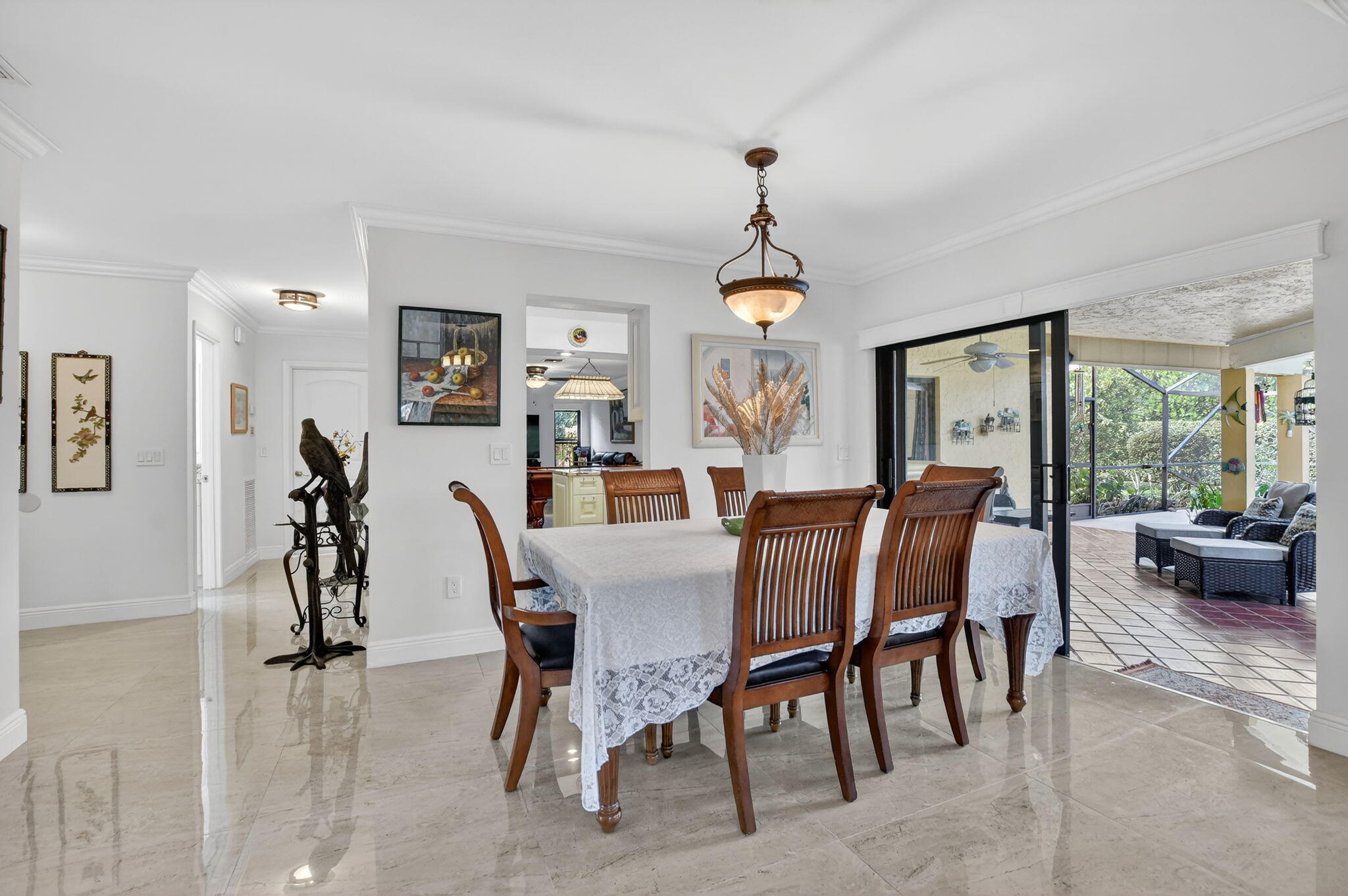 4205 Birchwood Drive Boca Raton, FL 33487 - Photo 16 of 75 a view of a dining room with furniture