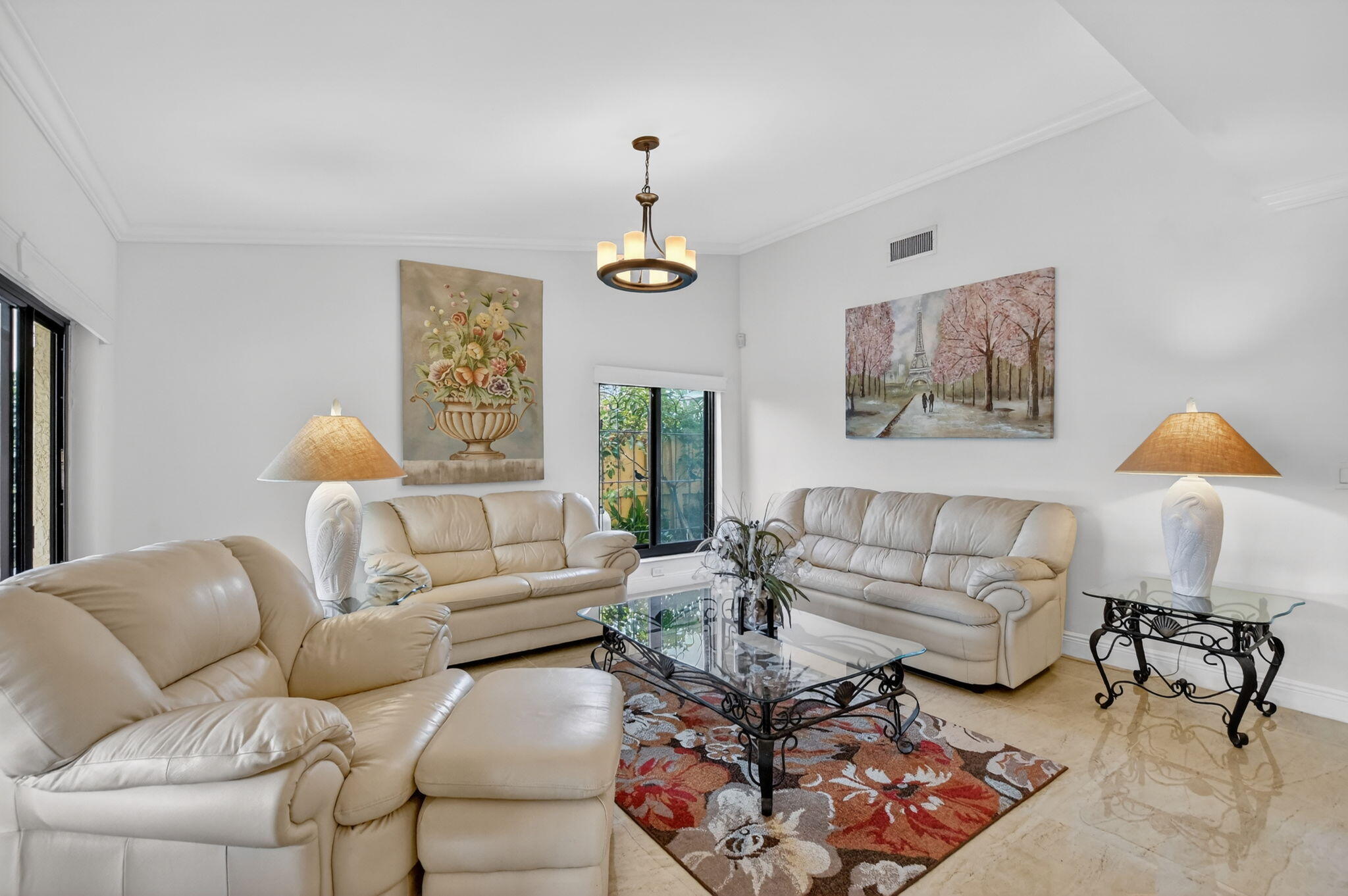 4205 Birchwood Drive Boca Raton, FL 33487 - Photo 20 of 75 a living room with furniture a rug and a window
