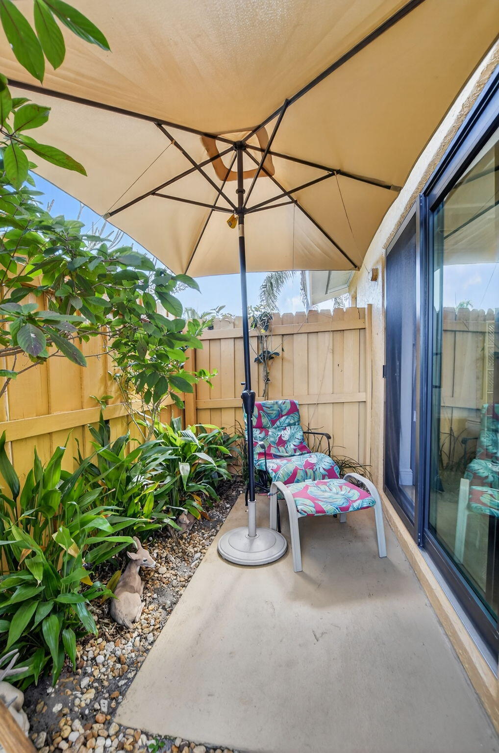 4205 Birchwood Drive Boca Raton, FL 33487 - Photo 37 of 75 a view of a tables and chairs in patio