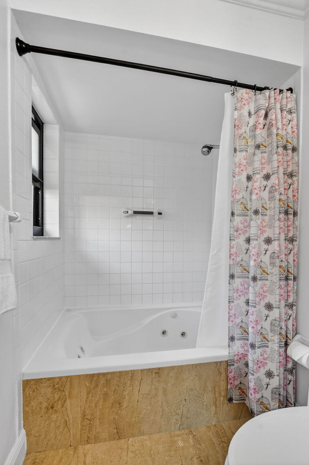 4205 Birchwood Drive Boca Raton, FL 33487 - Photo 40 of 75 a bathroom with a bathtub and shower
