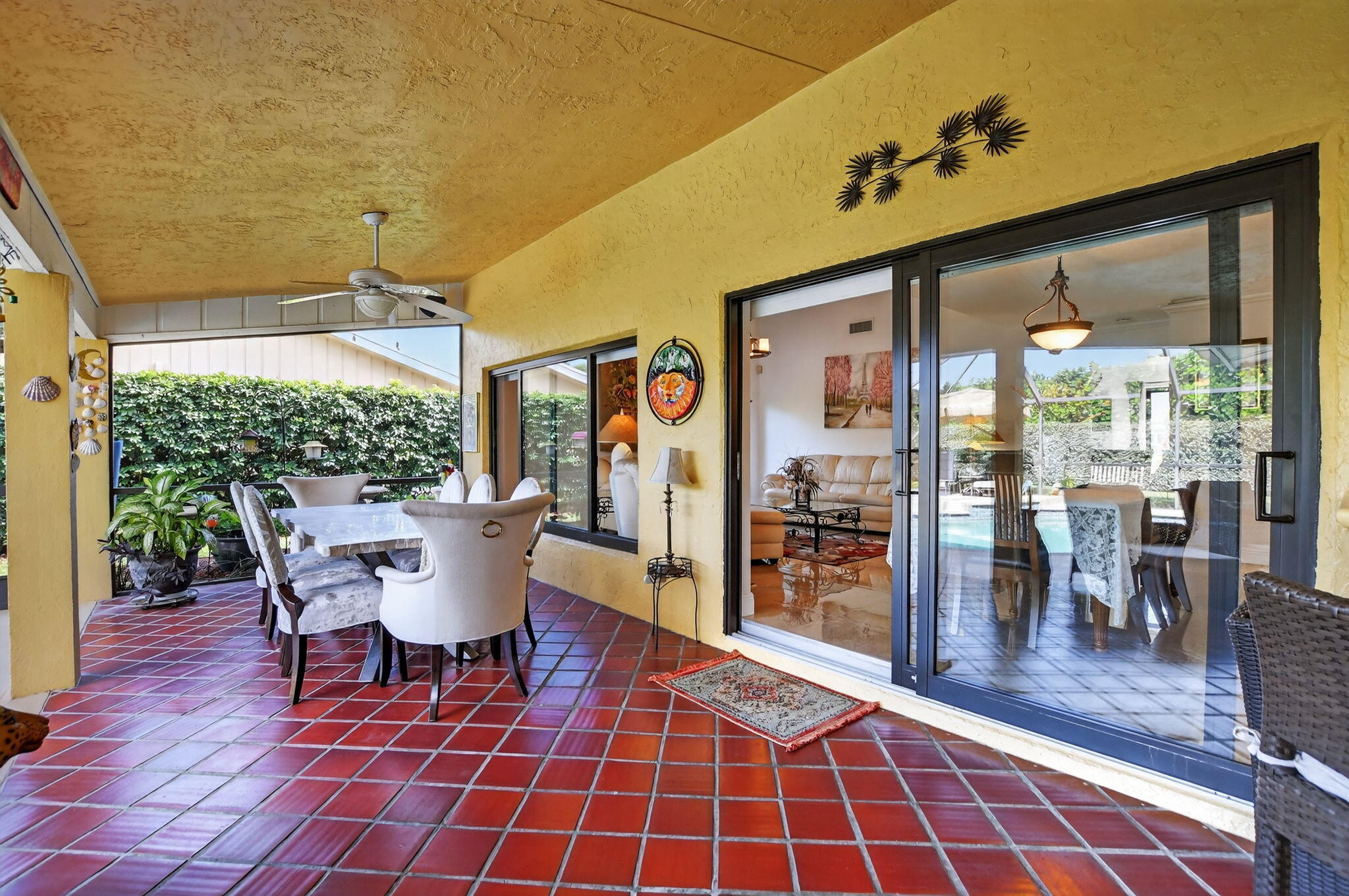 4205 Birchwood Drive Boca Raton, FL 33487 - Photo 51 of 75 a view of a dining room with furniture window and outside view