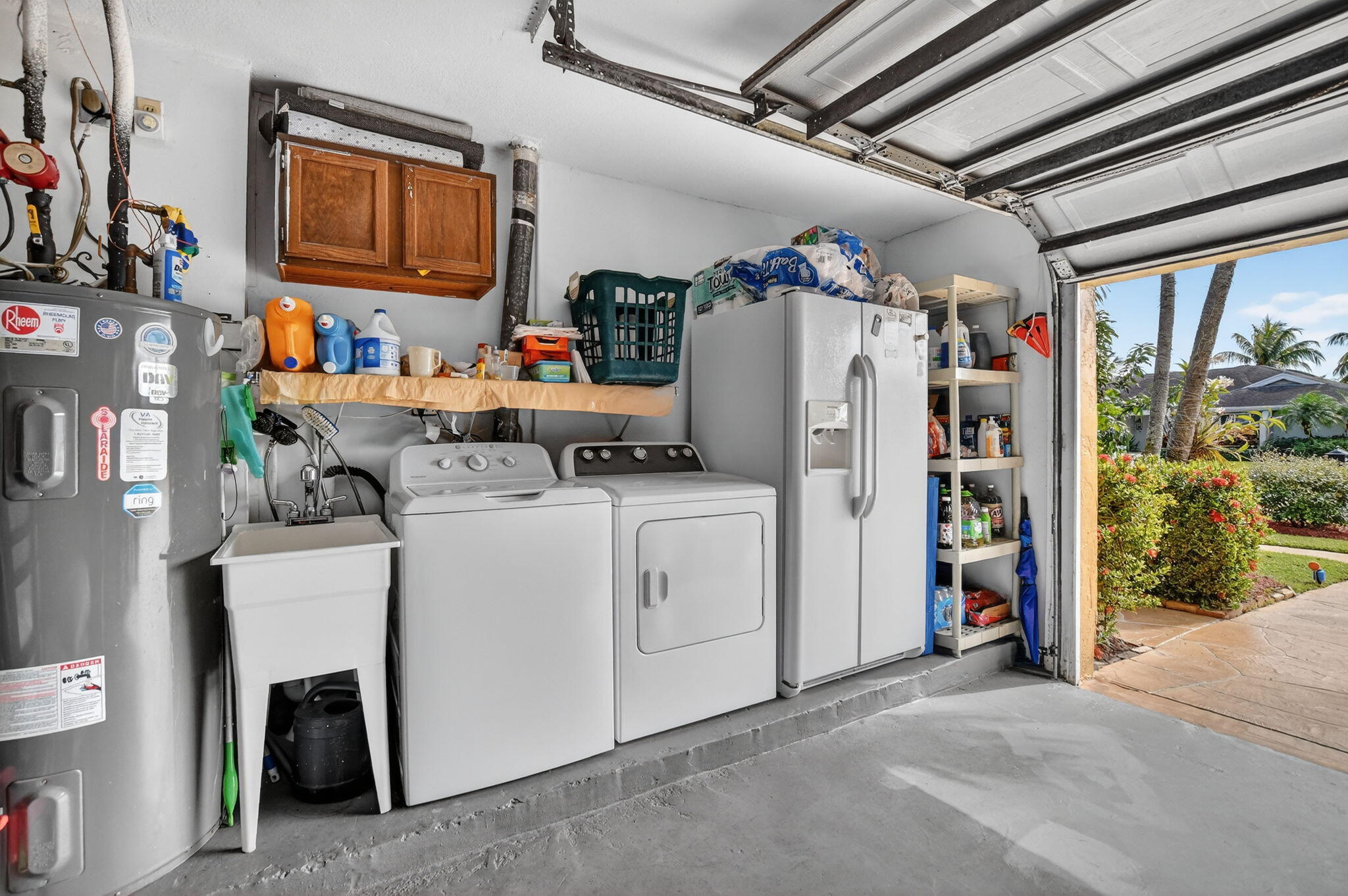 4205 Birchwood Drive Boca Raton, FL 33487 - Photo 65 of 75 a utility room with dryer and washer
