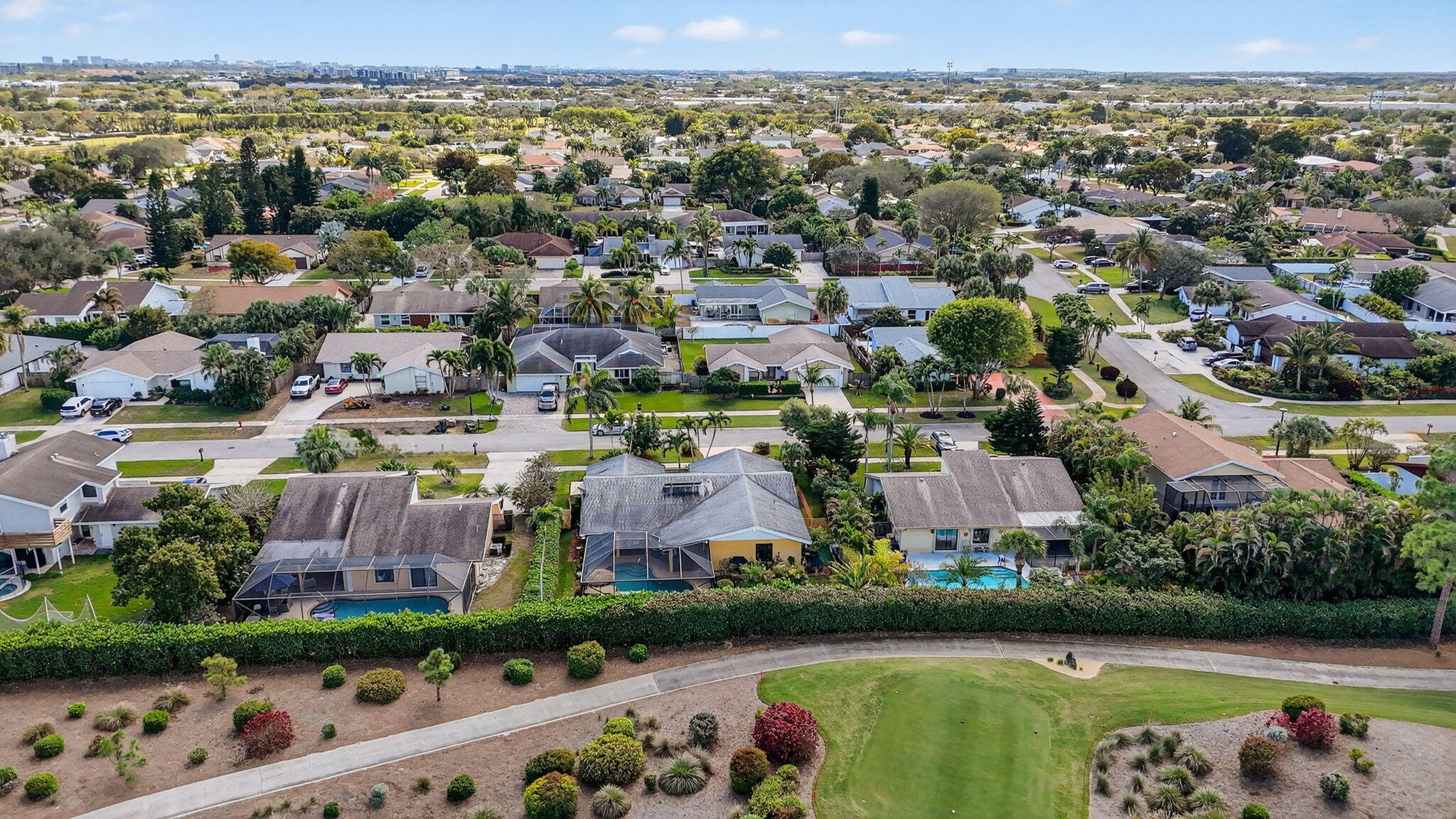 4205 Birchwood Drive Boca Raton, FL 33487 - Photo 69 of 75 an aerial view of a house with a garden