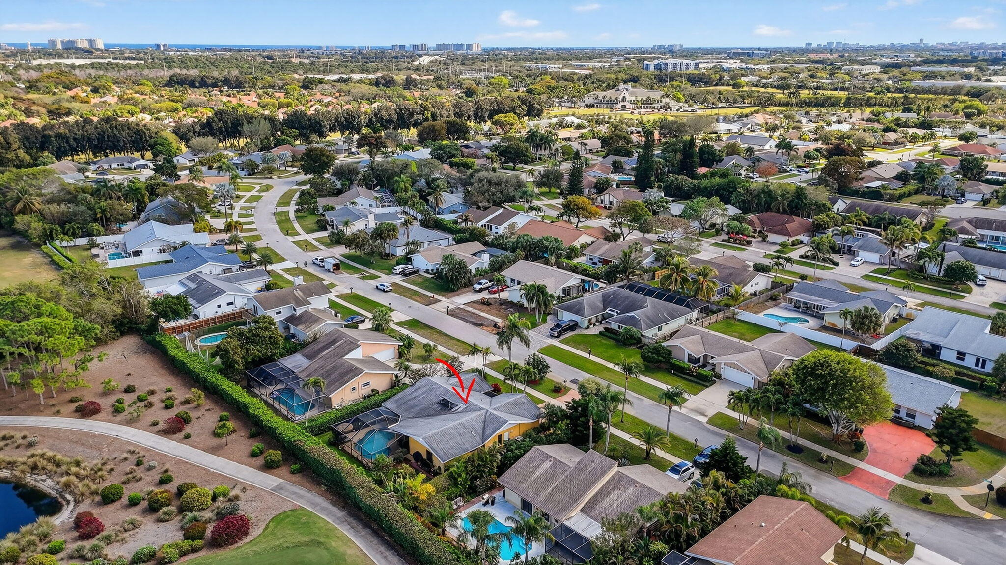 4205 Birchwood Drive Boca Raton, FL 33487 - Photo 73 of 75 an aerial view of a city with lots of residential buildings