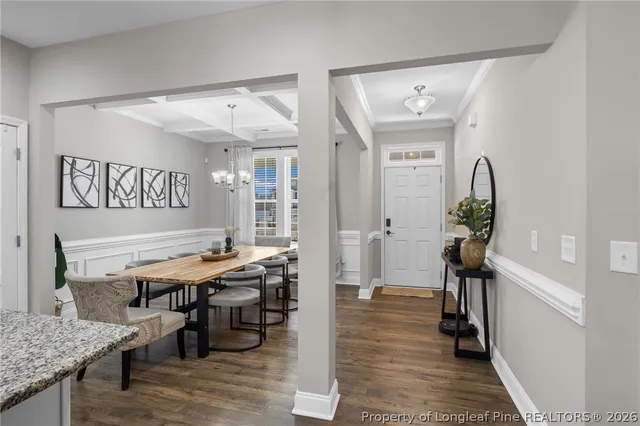 a view of a livingroom with furniture and wooden floor