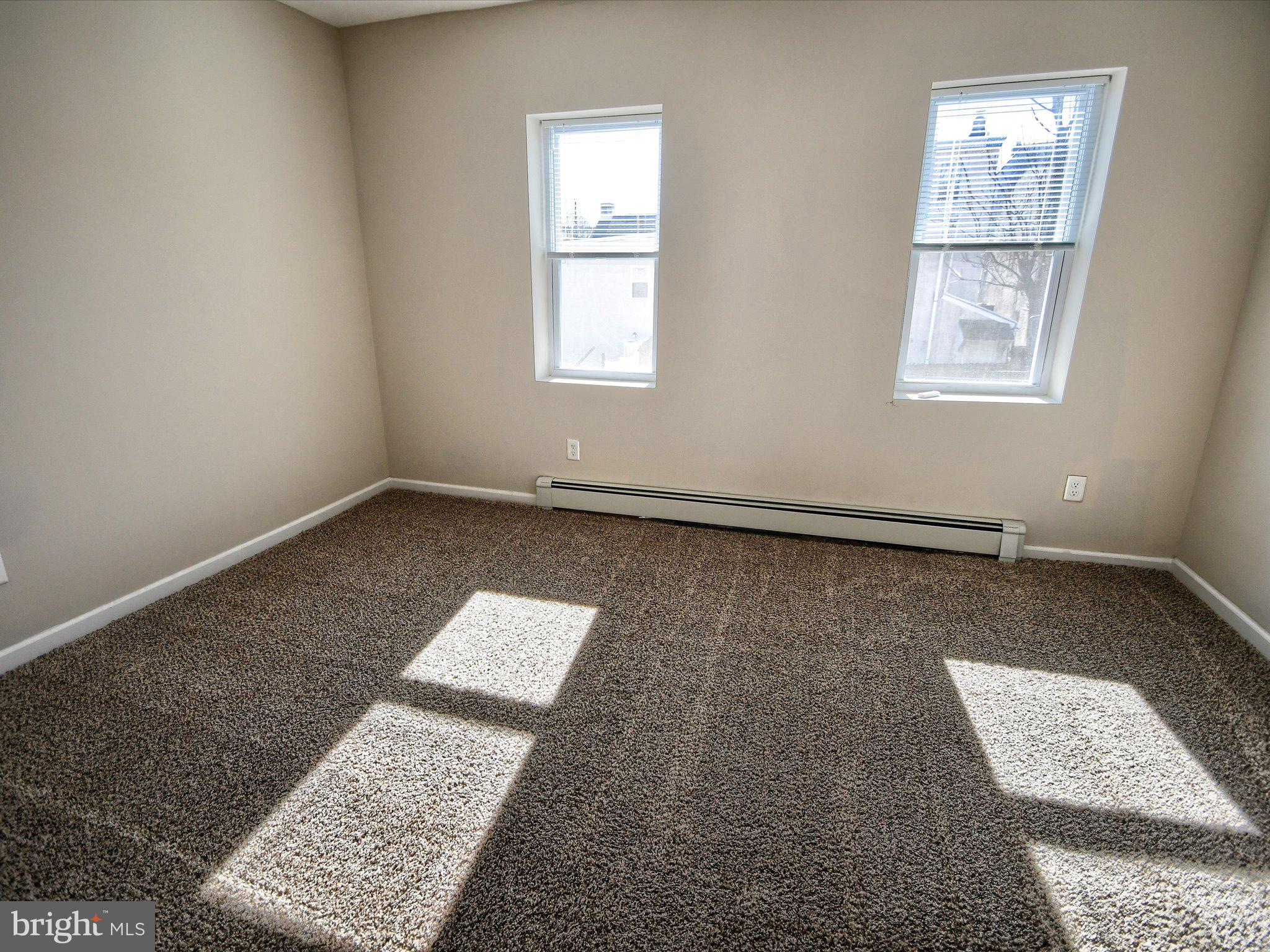 24 West Front Street Bridgeport, PA 19405 - Photo 13 of 32 an empty room with windows
