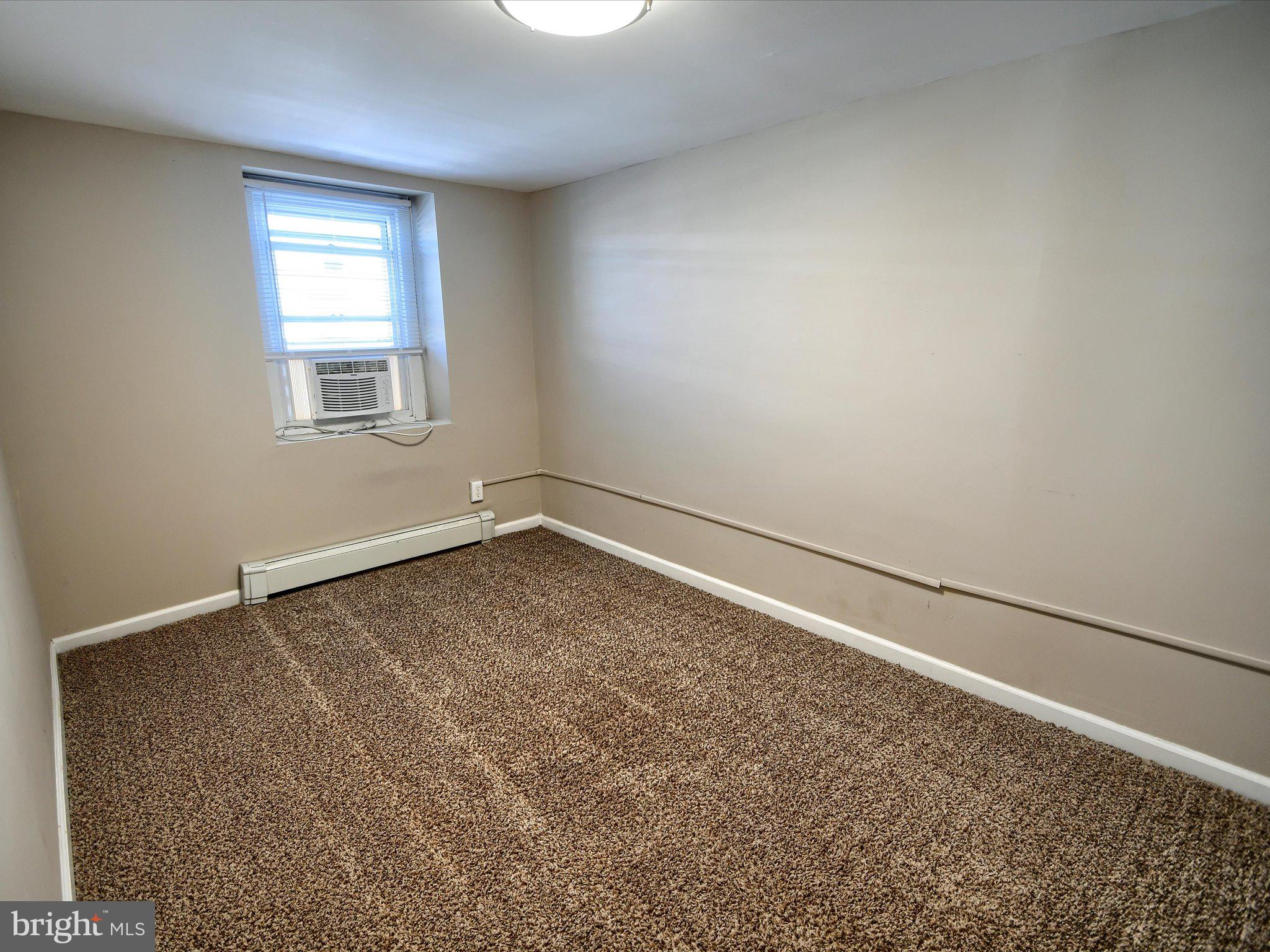24 West Front Street Bridgeport, PA 19405 - Photo 15 of 32 an empty room with a window