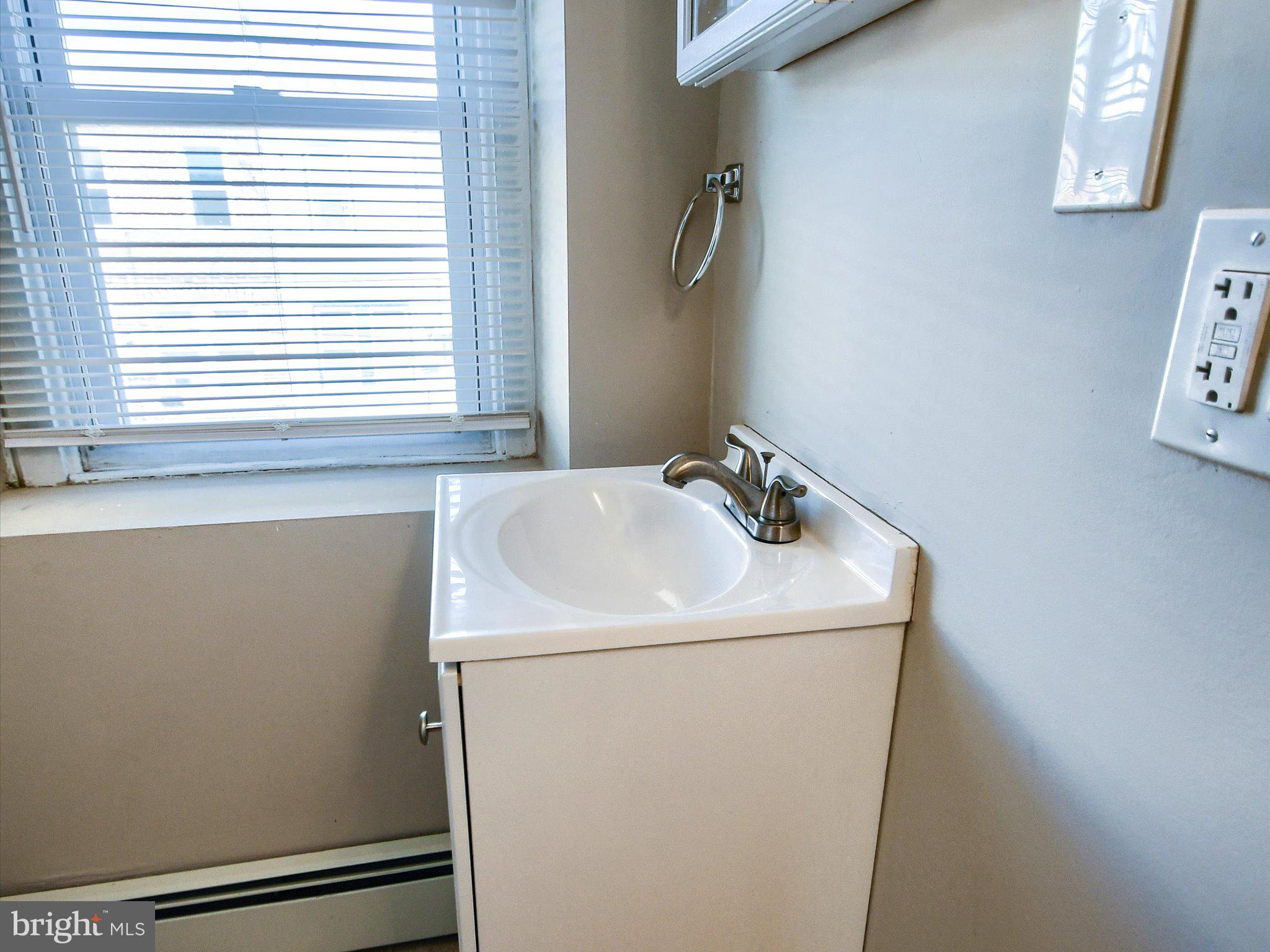 24 West Front Street Bridgeport, PA 19405 - Photo 18 of 32 a utility room with dryer and washer