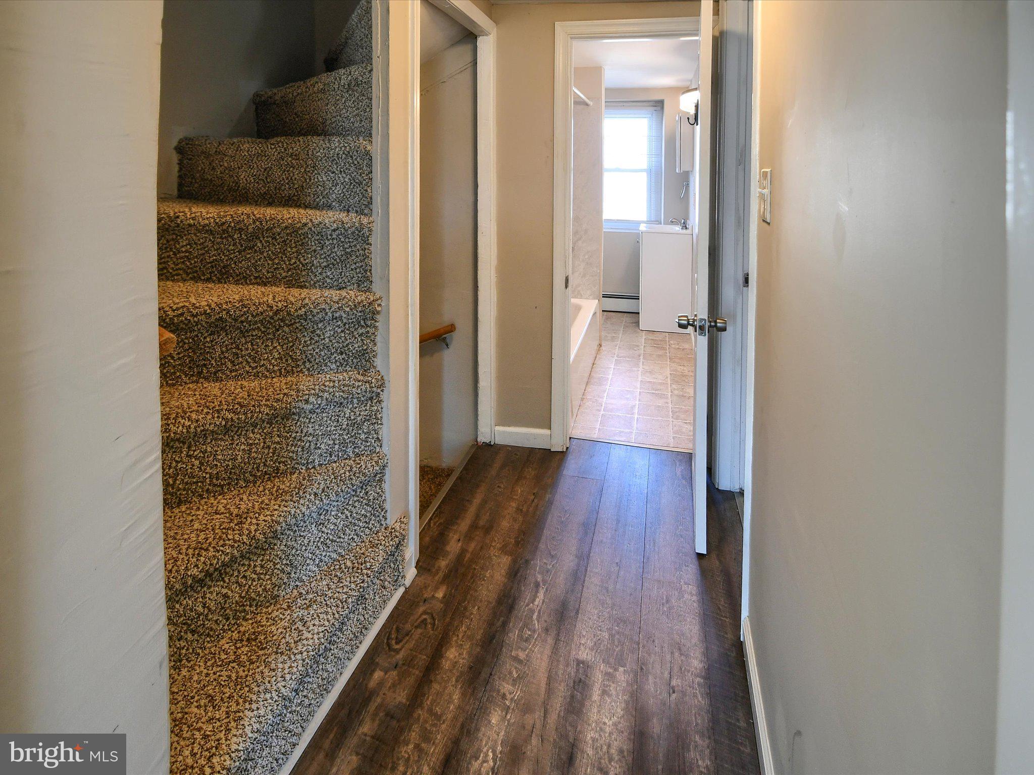 24 West Front Street Bridgeport, PA 19405 - Photo 20 of 32 a view of a bathroom from a hallway