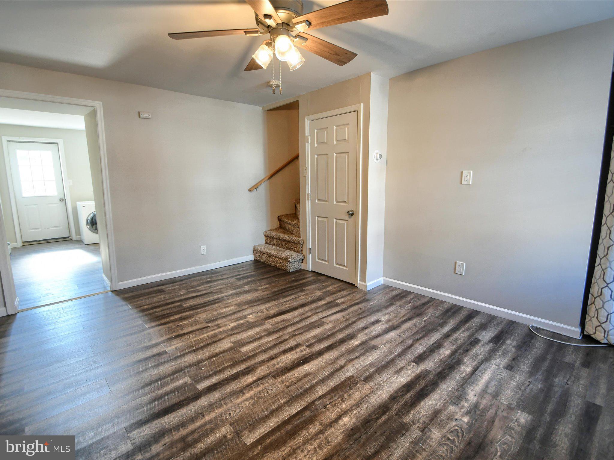 24 West Front Street Bridgeport, PA 19405 - Photo 4 of 32 wooden floor in an empty room with a window