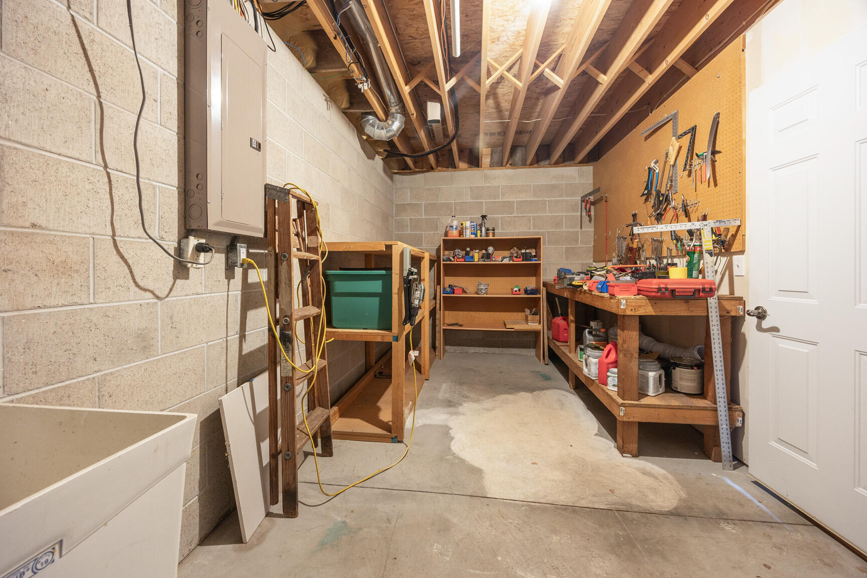 1300 Oak Tree Court Slinger, WI 53086 - Photo 38 of 40 Storage Room in Garage