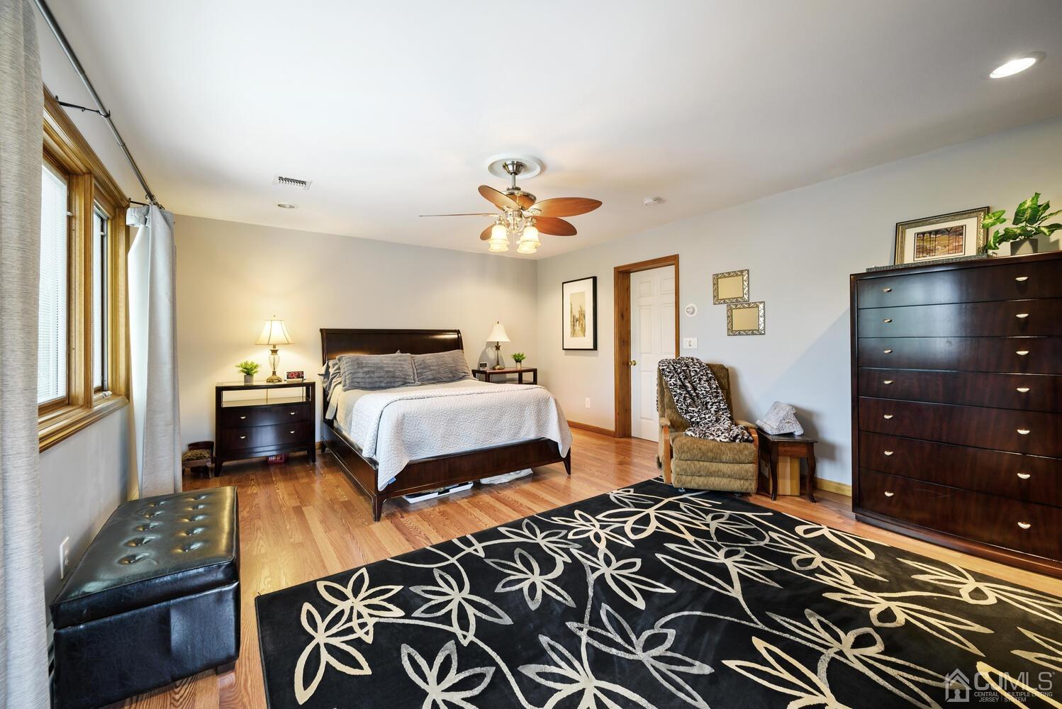 28 Rector Avenue Woodbridge, NJ 07095 - Photo 21 of 32 a bedroom with a bed and wooden floor