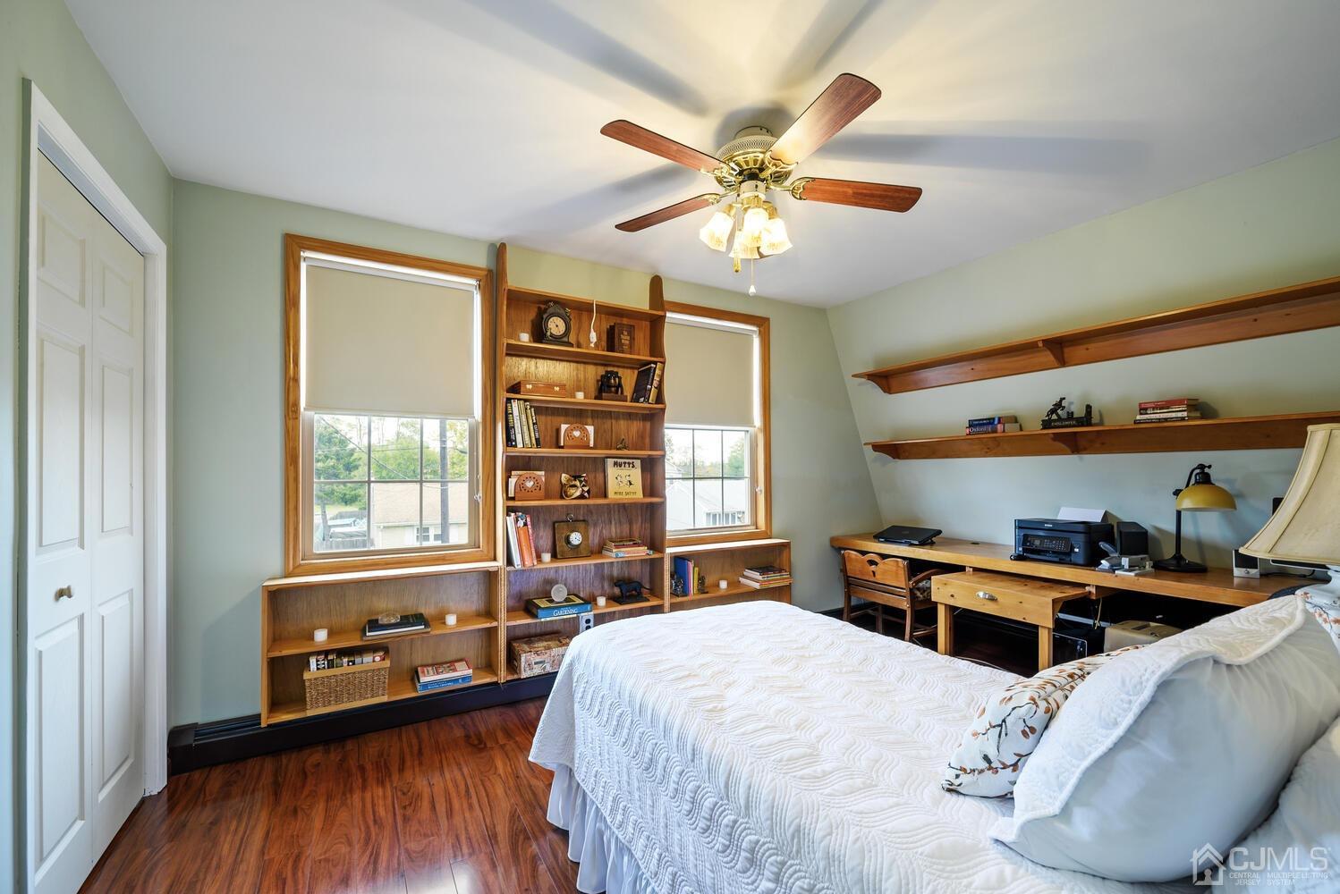 28 Rector Avenue Woodbridge, NJ 07095 - Photo 26 of 32 a bedroom with a bed and a chandelier