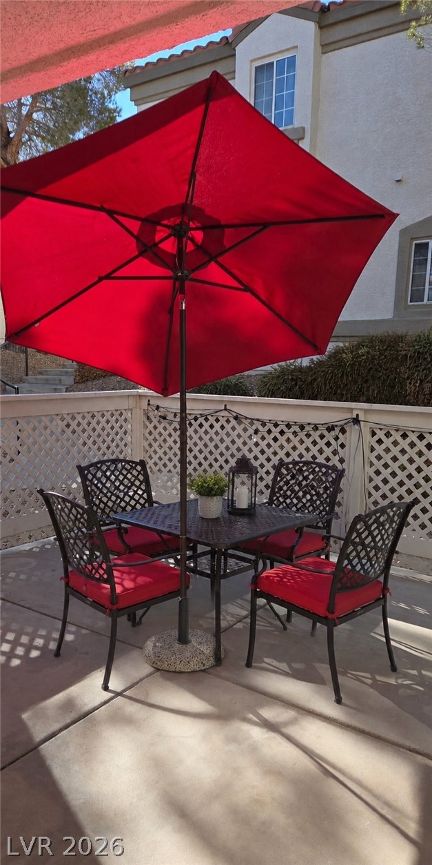 346 Seine Way Henderson, NV 89014 - Photo 14 of 24 An inviting outdoor patio, perfect for shaded relaxation or entertaining guests.
