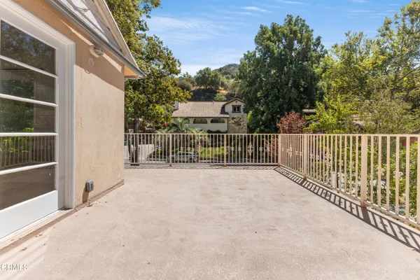 a view of backyard with green space