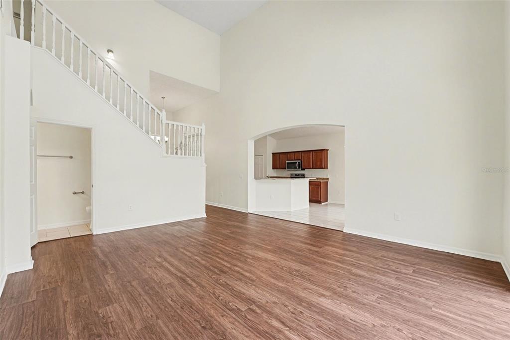 320 Snook Way Kissimmee, FL 34759 - Photo 12 of 15 a view of empty room with wooden floor