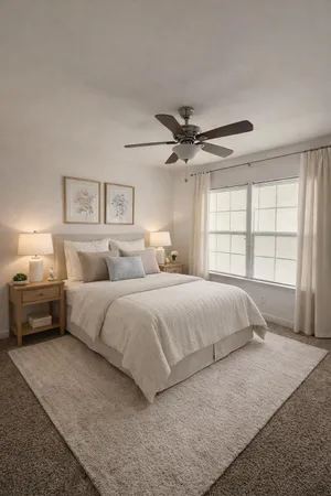 a bedroom with a large bed and a window