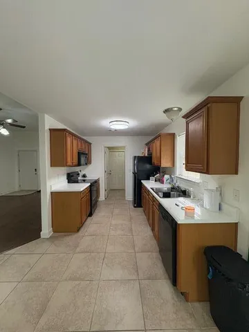 a view of a storage & utility room in back yard