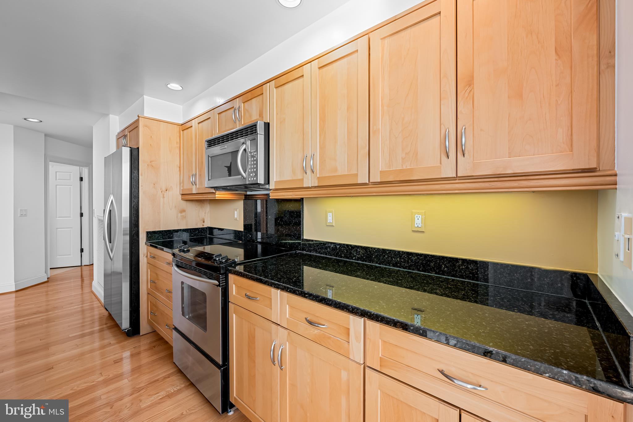 3704 North Charles Street, Unit 406 Baltimore, MD 21218 - Photo 13 of 65 Kitchen complete with under-lit cabinets