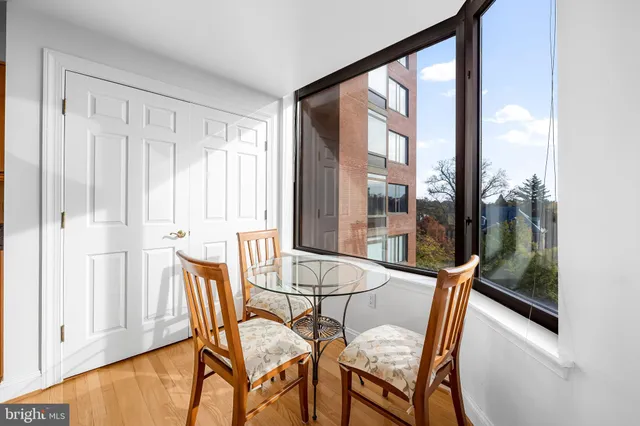 a bedroom with a bed and a dresser in it