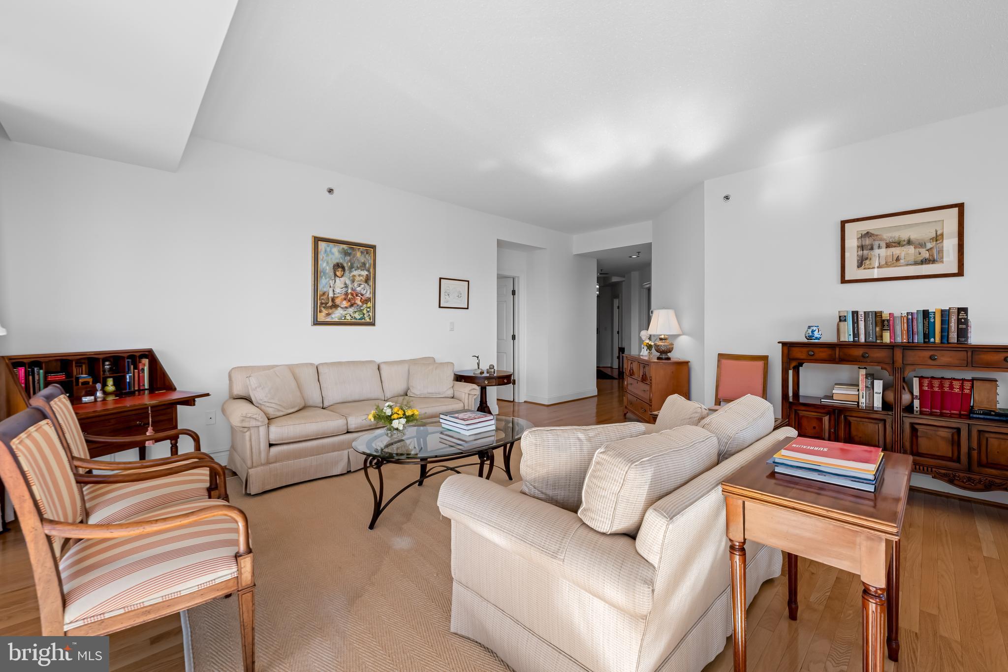 3704 North Charles Street, Unit 406 Baltimore, MD 21218 - Photo 18 of 65 a living room with furniture and a couch
