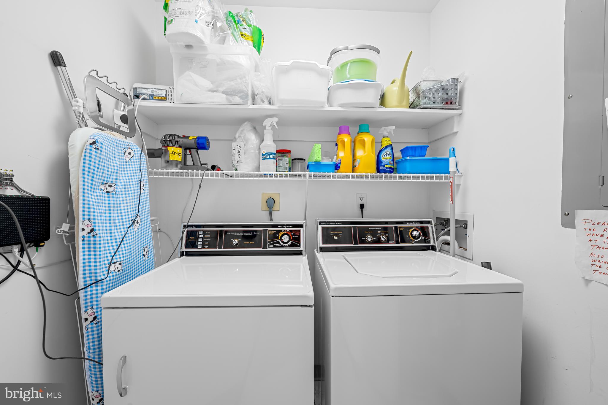 3704 North Charles Street, Unit 406 Baltimore, MD 21218 - Photo 26 of 65 a utility room with dryer and washer