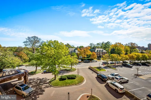 a view of a swimming pool with lounge chair