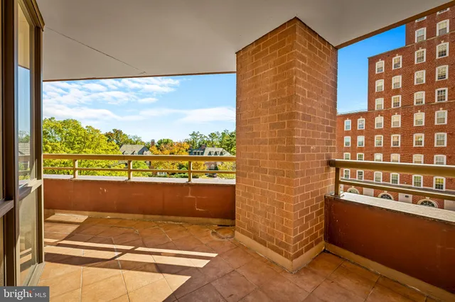 a view of a swimming pool with a lounge chairs