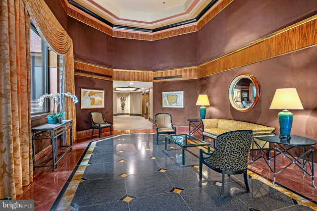 a kitchen with granite countertop cabinets stainless steel appliances and a window