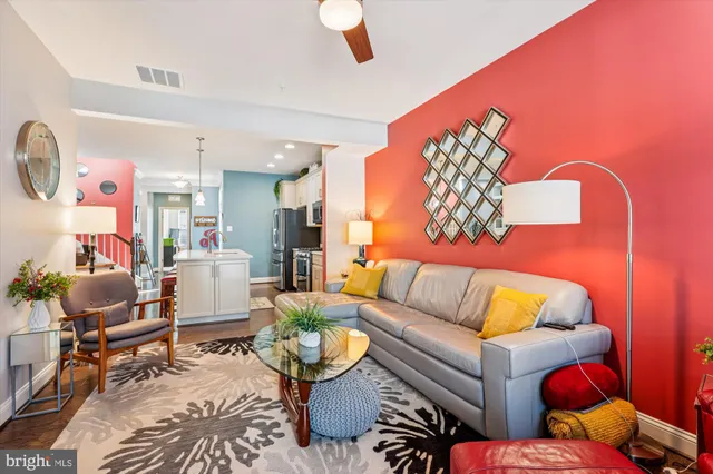 a living room with furniture and a couch