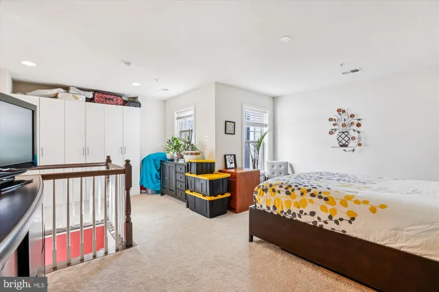 a bedroom with furniture and a bed