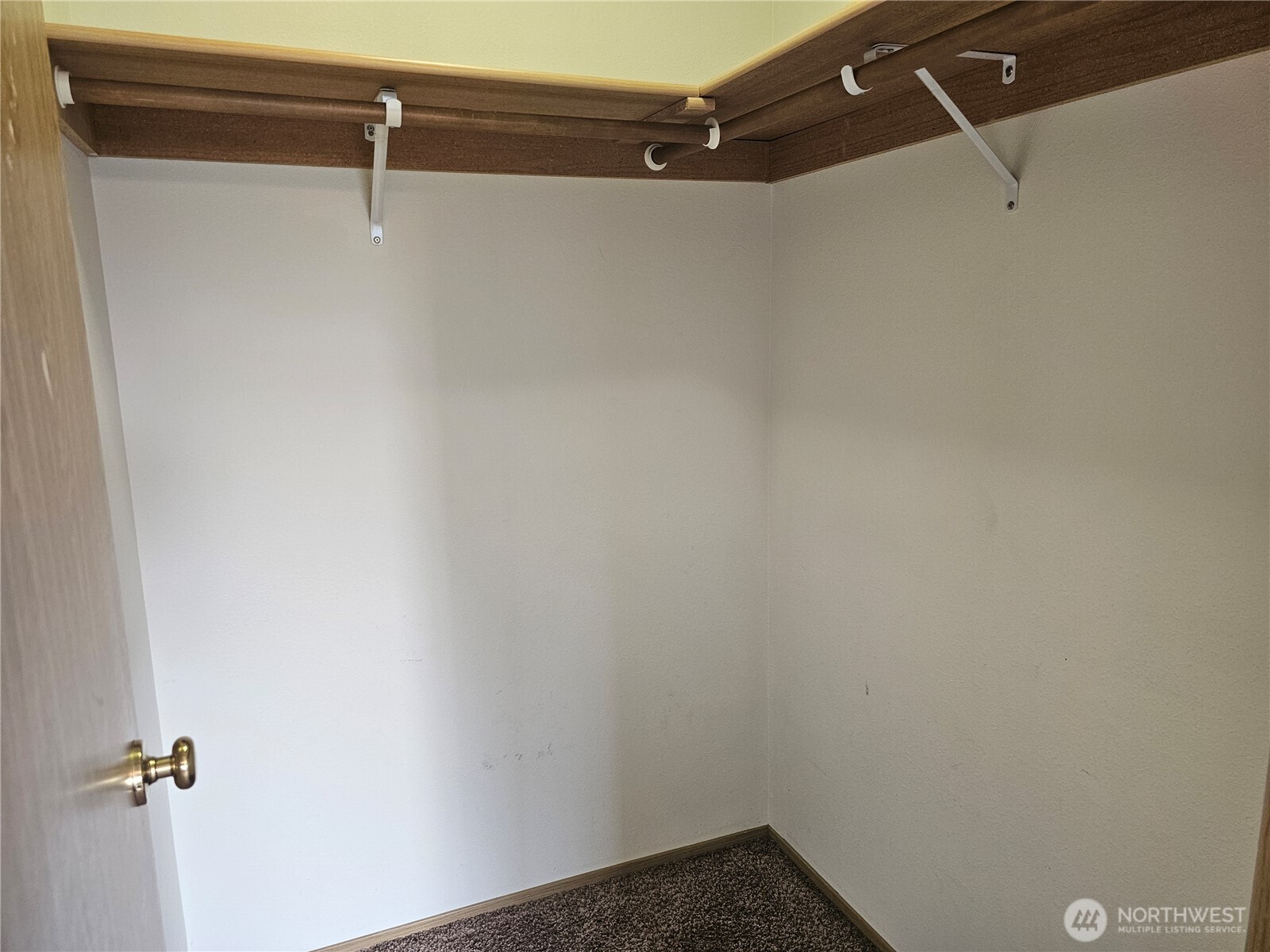 9814 Greenleaf Loop Southeast Yelm, WA 98597 - Photo 15 of 33 a view of a room with racks on the wall