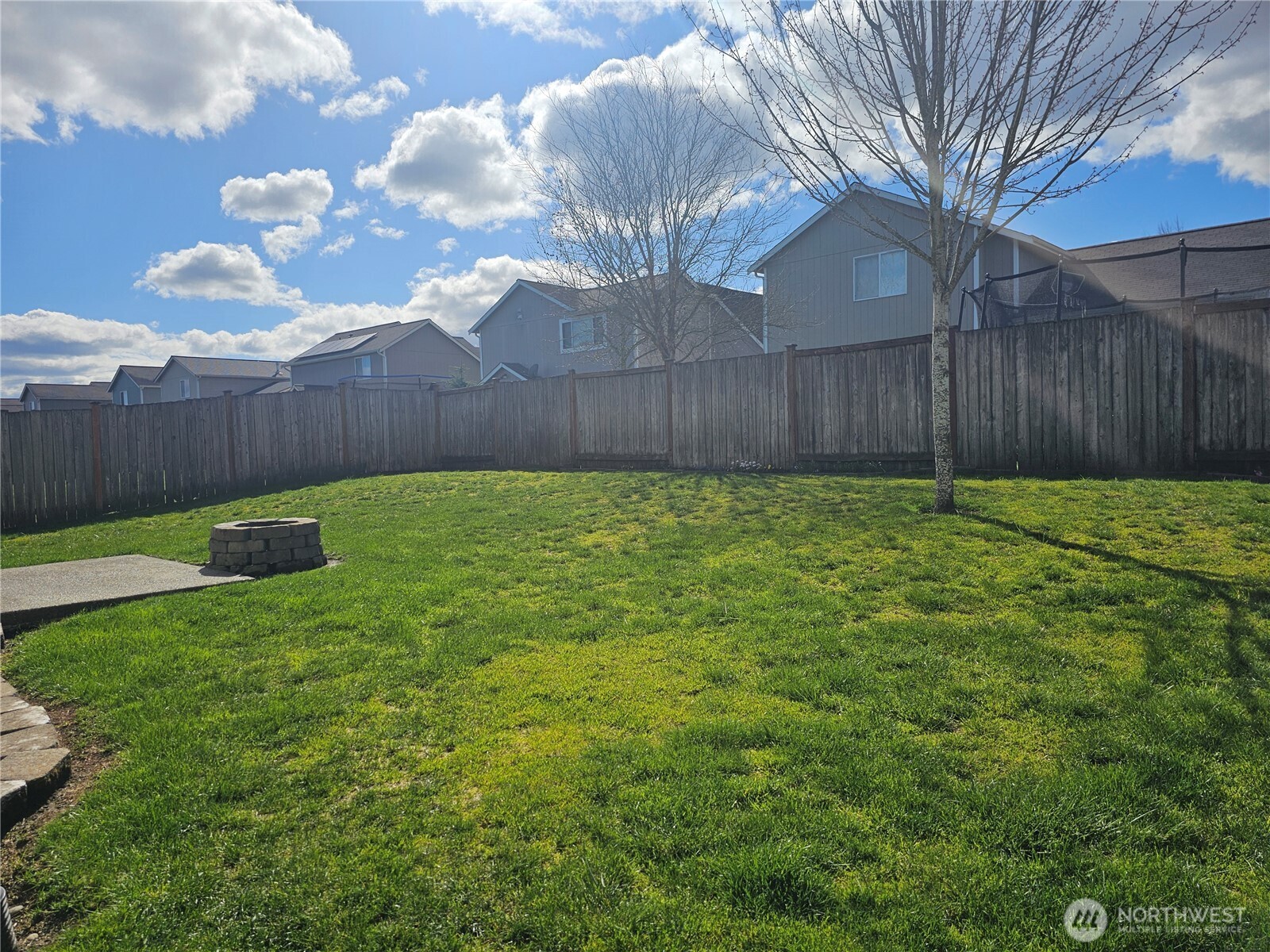 9814 Greenleaf Loop Southeast Yelm, WA 98597 - Photo 28 of 33 a view of a backyard