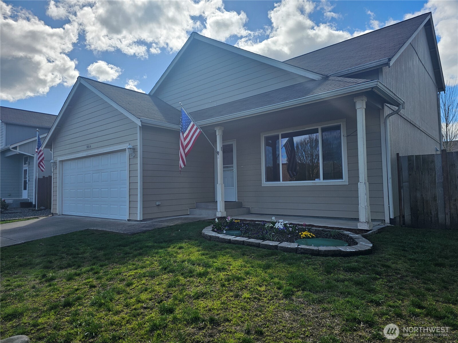 9814 Greenleaf Loop Southeast Yelm, WA 98597 - Photo 3 of 33 a front view of a house