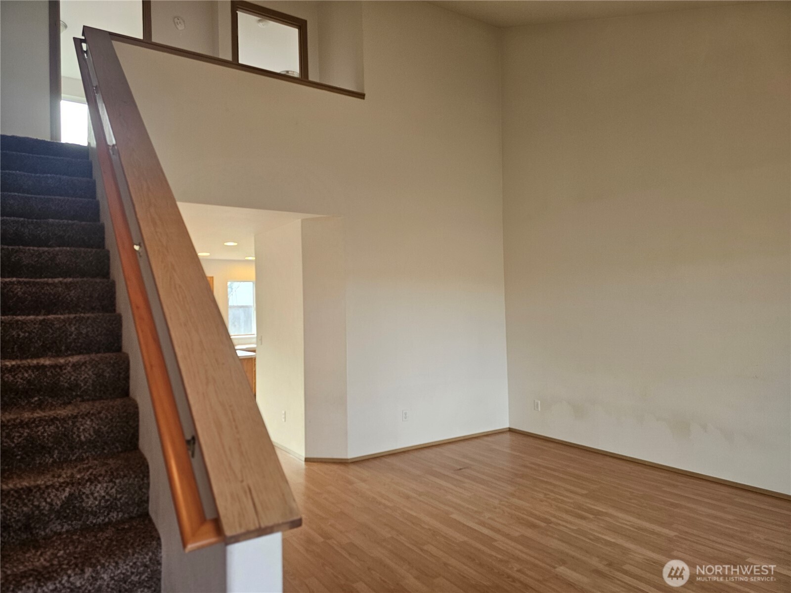 9814 Greenleaf Loop Southeast Yelm, WA 98597 - Photo 6 of 33 a view of an entryway with wooden floor