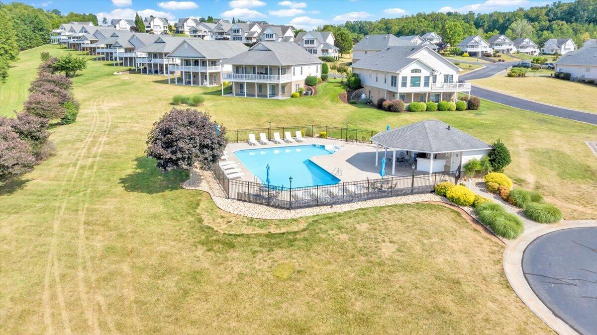 Lot 2 Lands End Circle Union Hall, VA 24176 - Photo 20 of 44 a view of a swimming pool with a lawn chairs under an umbrella