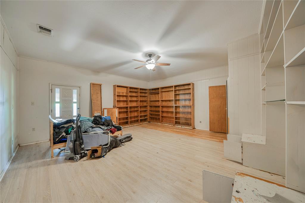 1006 Rikkity Lane Mount Pleasant, TX 75455 - Photo 15 of 39 a view of a livingroom with workspace and a window