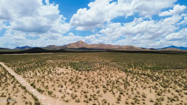 a view of a lake with a city
