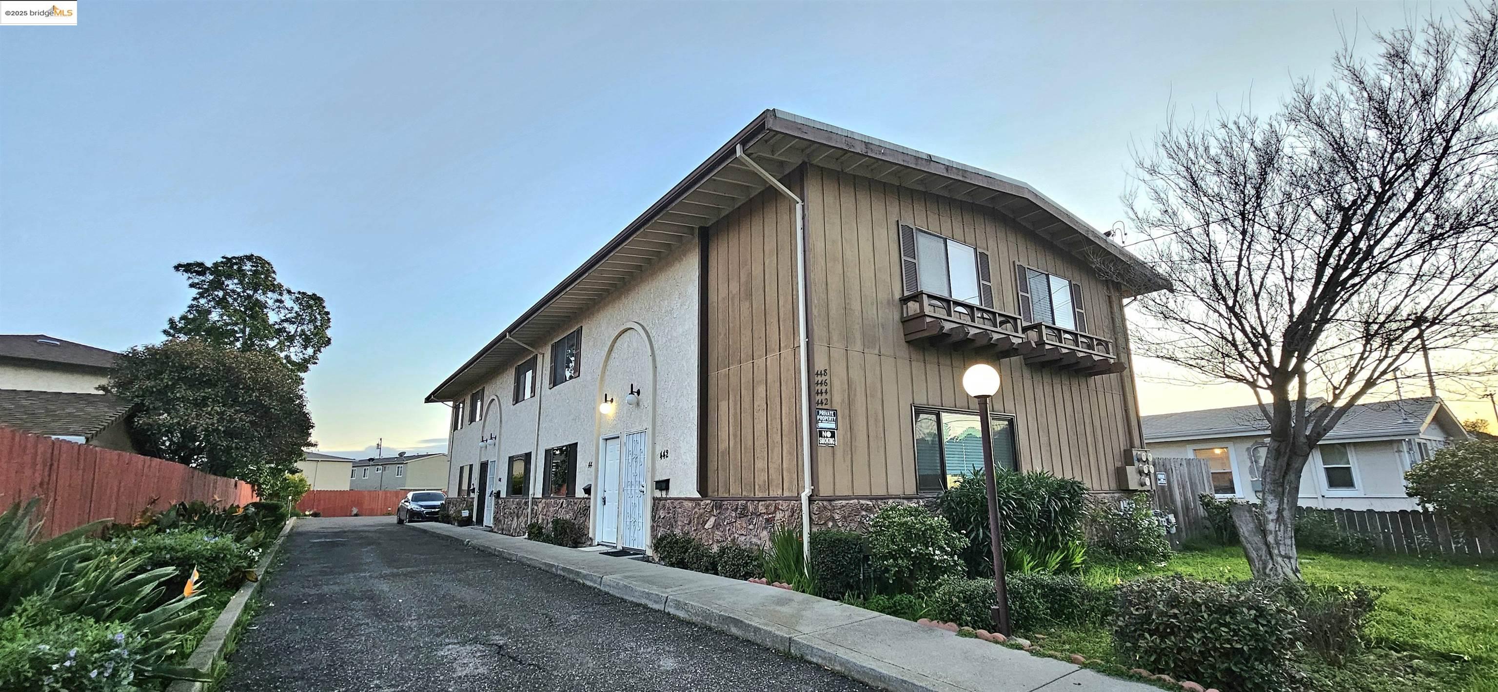 444 Schafer Road Hayward, CA 94544 - Photo 1 of 1 a view of a house with a yard and plants